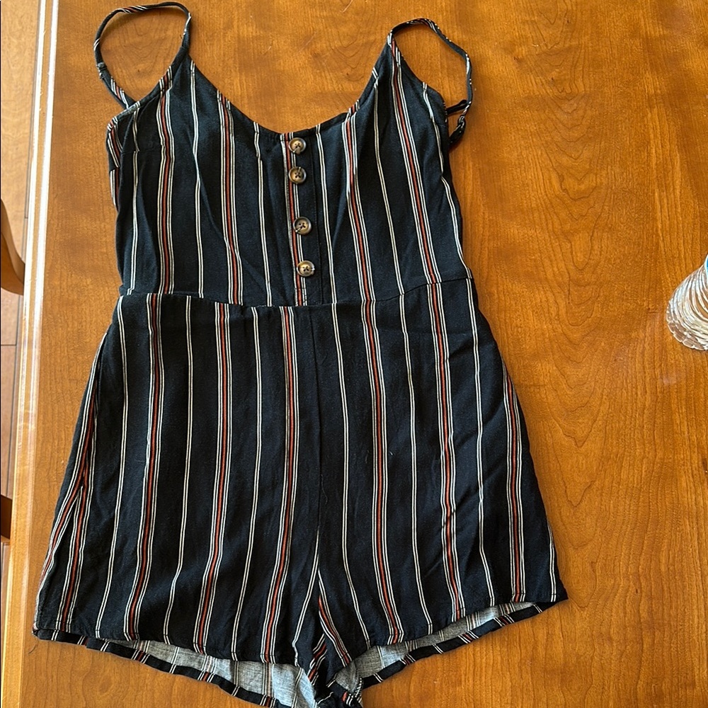 Chic Black Striped Romper with Button Accents